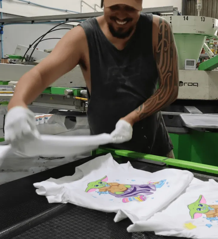 Folding finished tees on the DRK LBL Gold Coast floor